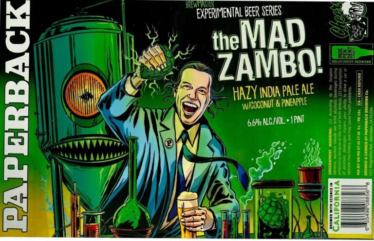 The Mad Zambo beer label from Paperback: A man in a lab coat holds a glowing green object while standing beside a large fermenter with shark-like teeth and bubbling beakers.