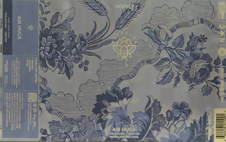 Air Hugs beer label from Hopfly: Blue floral and wheat motifs on a pale background with stylized clouds; central golden lotus logo above 'AIR HUGS' text.