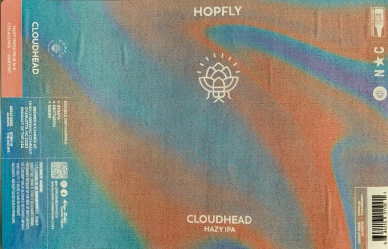 Cloudhead beer label from Hopfly: A white line drawing of a stylized lotus flower with radiating lines above it, centered on an abstract background blending blue and orange.