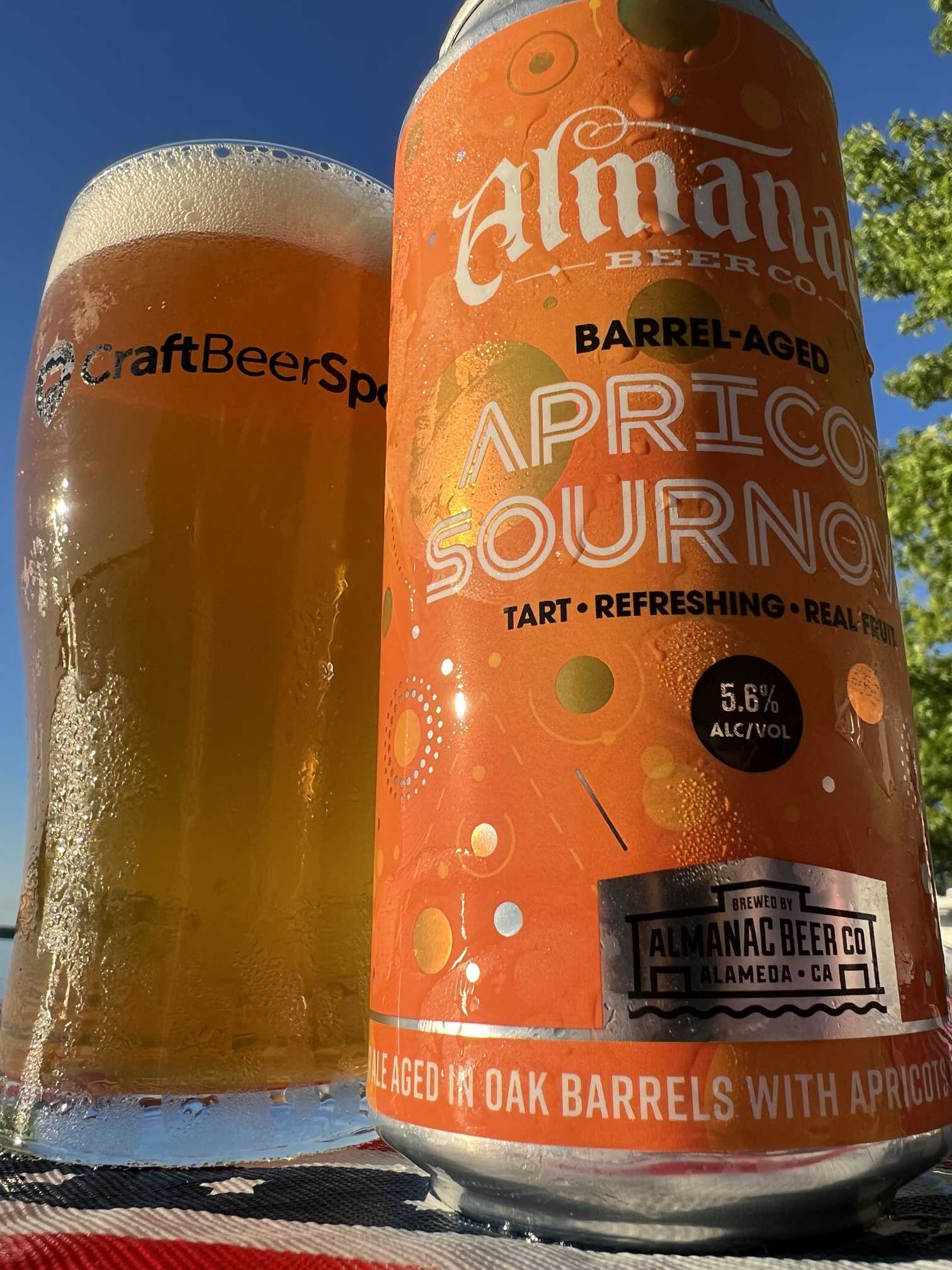 Almanac Apricot Sournova can with a glass