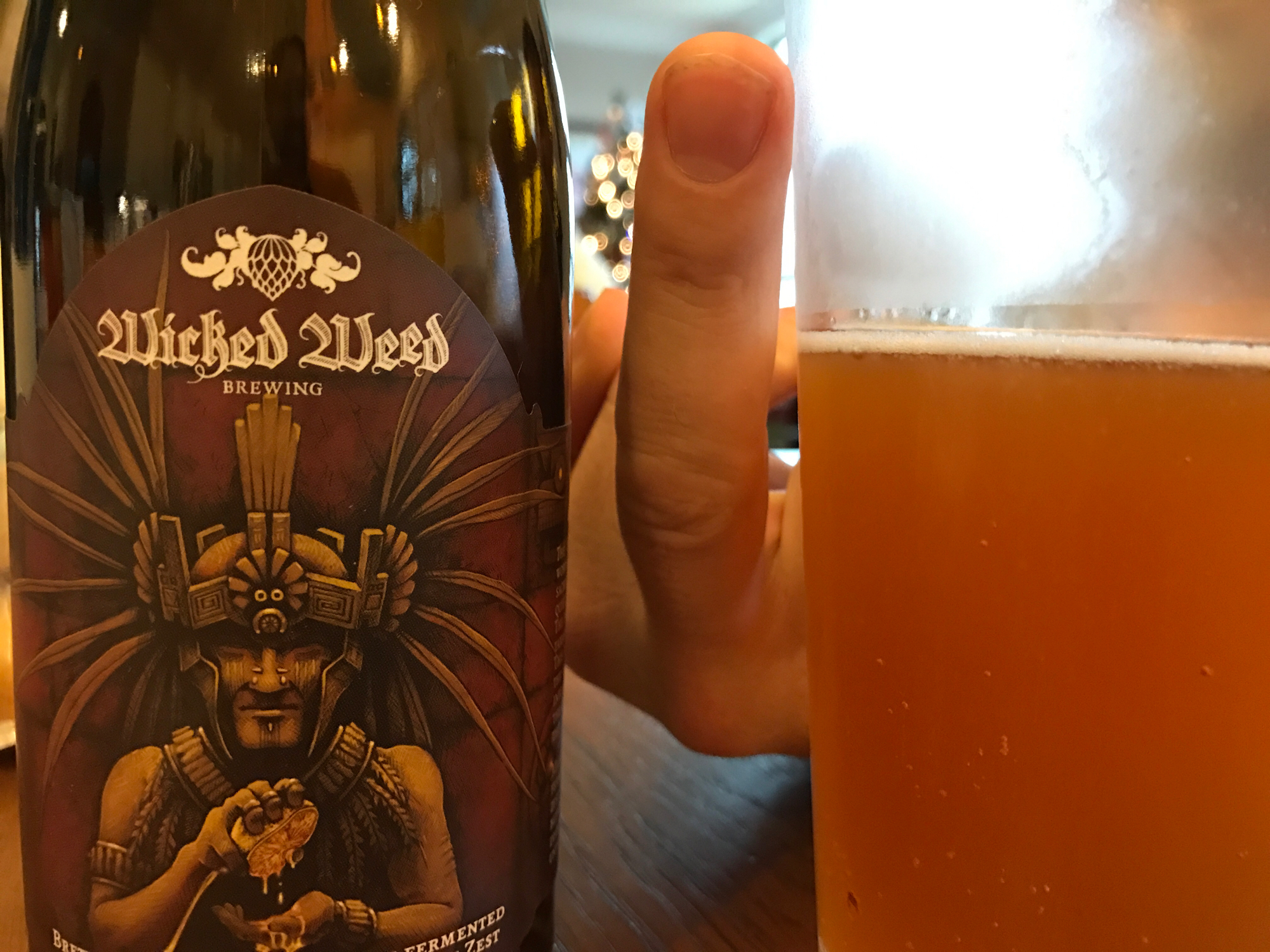 Wicked Weed Malice 2016 bottle with a glass