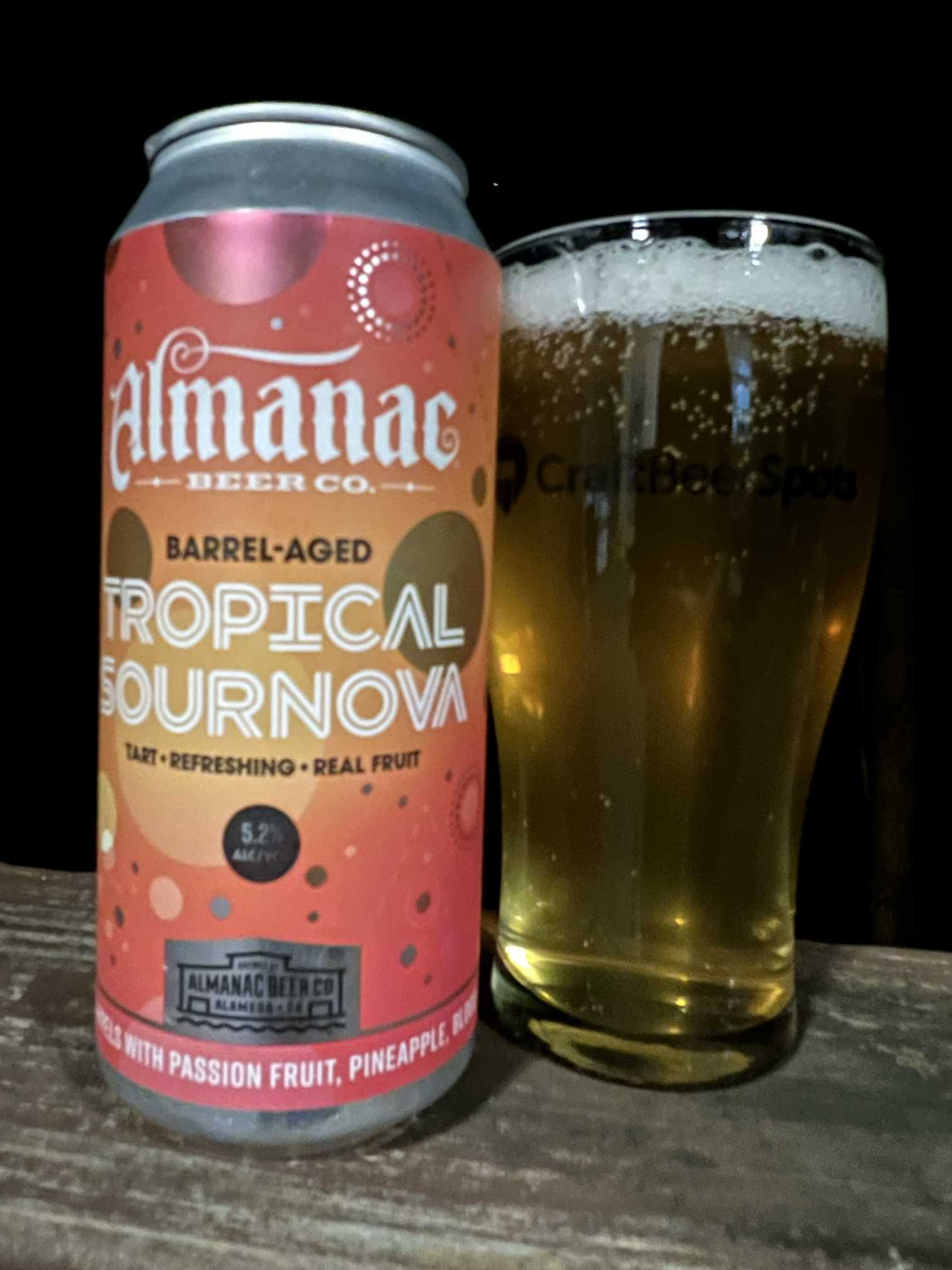 Almanac Tropical Sournova can with a glass
