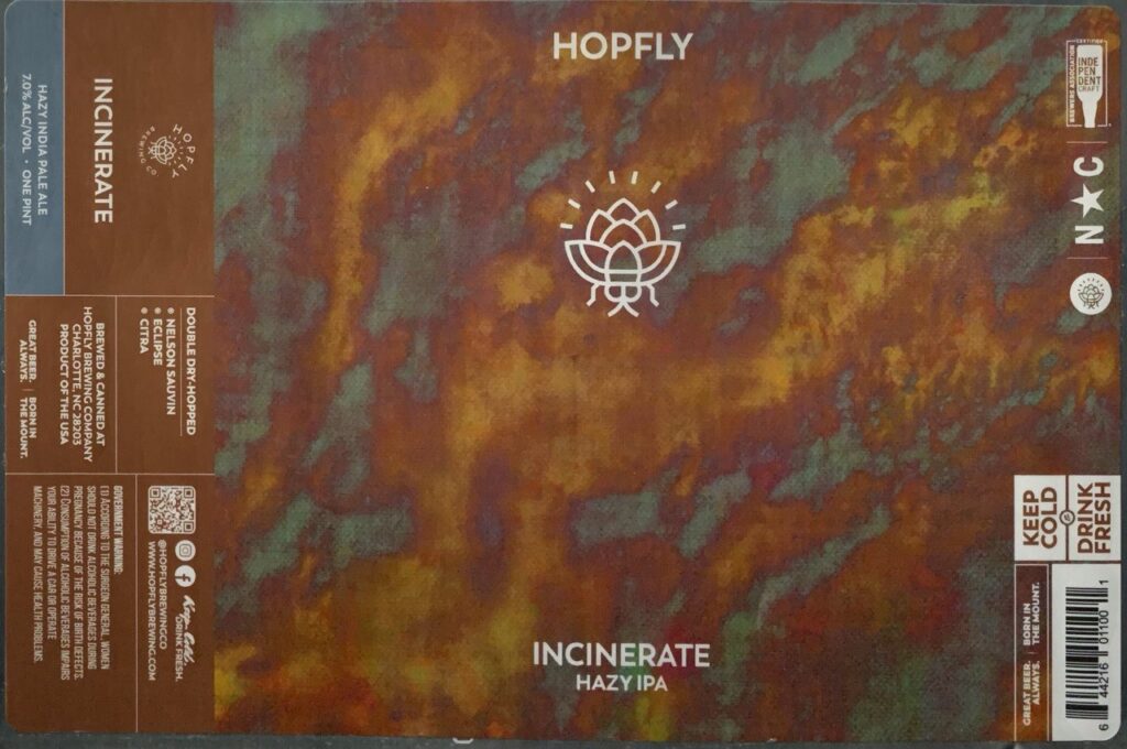 Incinerate mottled rust, orange, burgundy, and green beer label with white HopFly emblem
